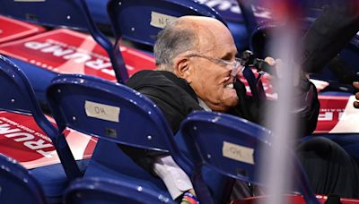 Rudy Giuliani Crashes Into Empty Chairs After Bizarre Fall At RNC