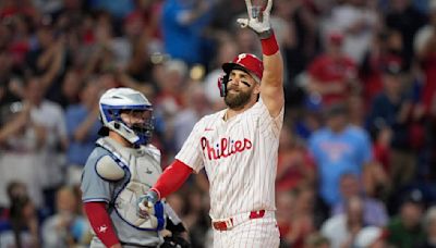 Harper hits grand slam, streaking Phillies rout Blue Jays 10-1