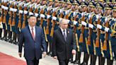 Xi lauds China-Russia ties as Putin lands in Beijing