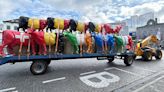 Farmers wheel plaster cows through Brussels to demand 'fair' milk prices