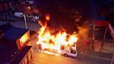 Man, 37, charged with violent disorder & arson after bus set ablaze