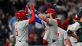 Bryce Harper hits a 3-run homer in Phillies' 9th-inning rally to beat Rockies 8-4