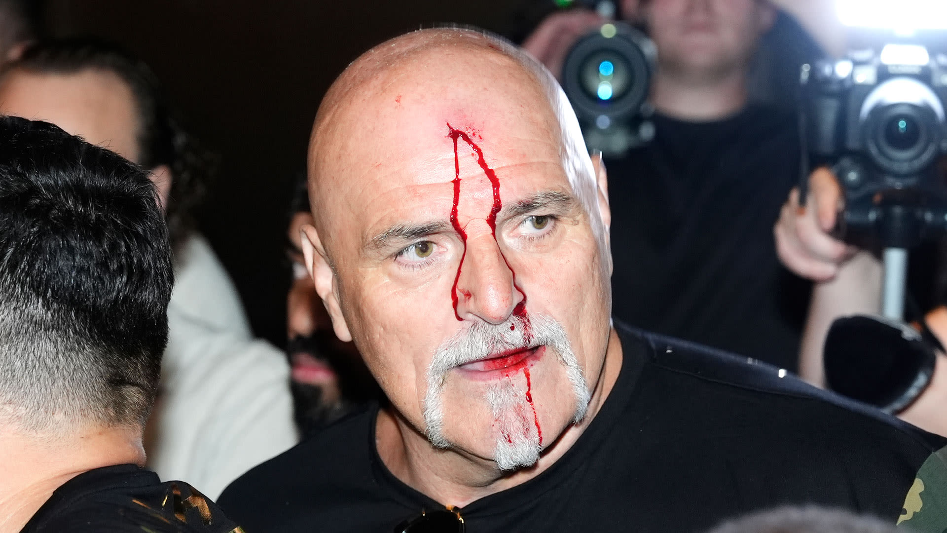 Watch shocking moment Tyson Fury's dad John HEADBUTTS member of Usyk's camp