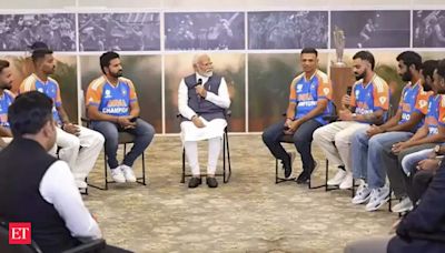 In Pics: PM Narendra Modi's chat session with Rohit Sharma, Virat Kohli and co - Champions with PM Modi