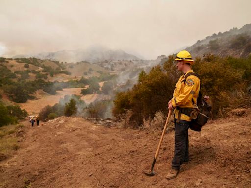 Wildfire destroys 13 homes in Northern California as heat wave is parked over the West