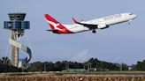 Australian airline Qantas agrees payouts over 'ghost flights'