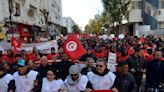 Tunisians protest inflation, president's squeeze on dissent