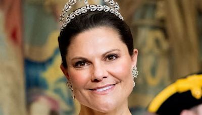 Crown Princess Victoria is picture-perfect in regal feathered look with heirloom tiara