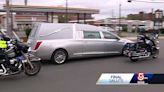 Taylor's hearse pauses outside former station in Lawrence