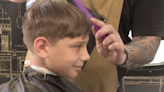 'They feel really good about themselves': Barber gives haircuts to local kids