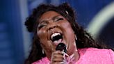Lizzo Gives an Epic Performance in a Pink Sequin Jumpsuit and Metallic Silver Pumps to Celebrate New Album Release