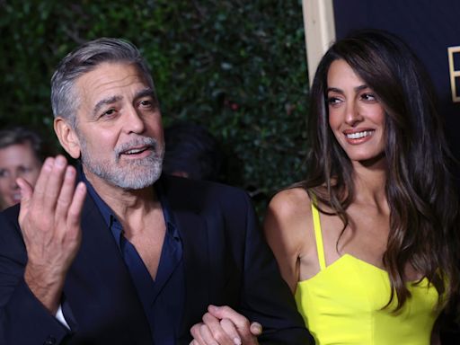 Amal and George Clooney Were Seen Kissing During a Lake Como Dinner