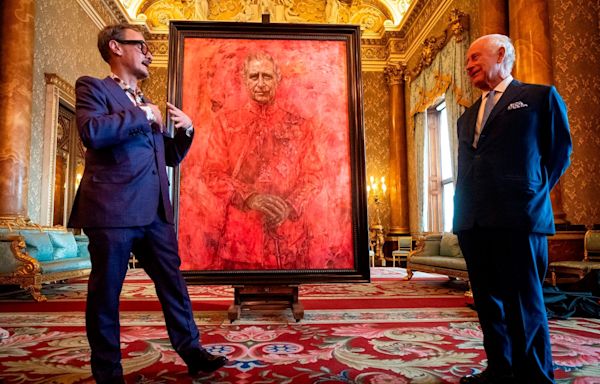Artist behind King Charles III's controversial portrait shares why he used the color red