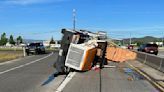 Semi truck rollover causes traffic backup on Highway 62