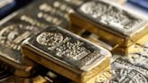 Gold Slips After Topping $2,400 as Rally Is Seen as Overextended