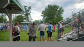 RAGBRAI riders stop for the Meskwaki Settlement's powwow near Tama-Toledo