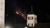 Wildfires burn overnight in Switzerland as police evacuate villages