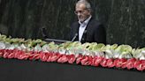 Iran's new president sworn in, pledges to fight economic sanctions