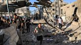 Israeli strike kills 16 at UN-run school in Gaza as ceasefire talks continue