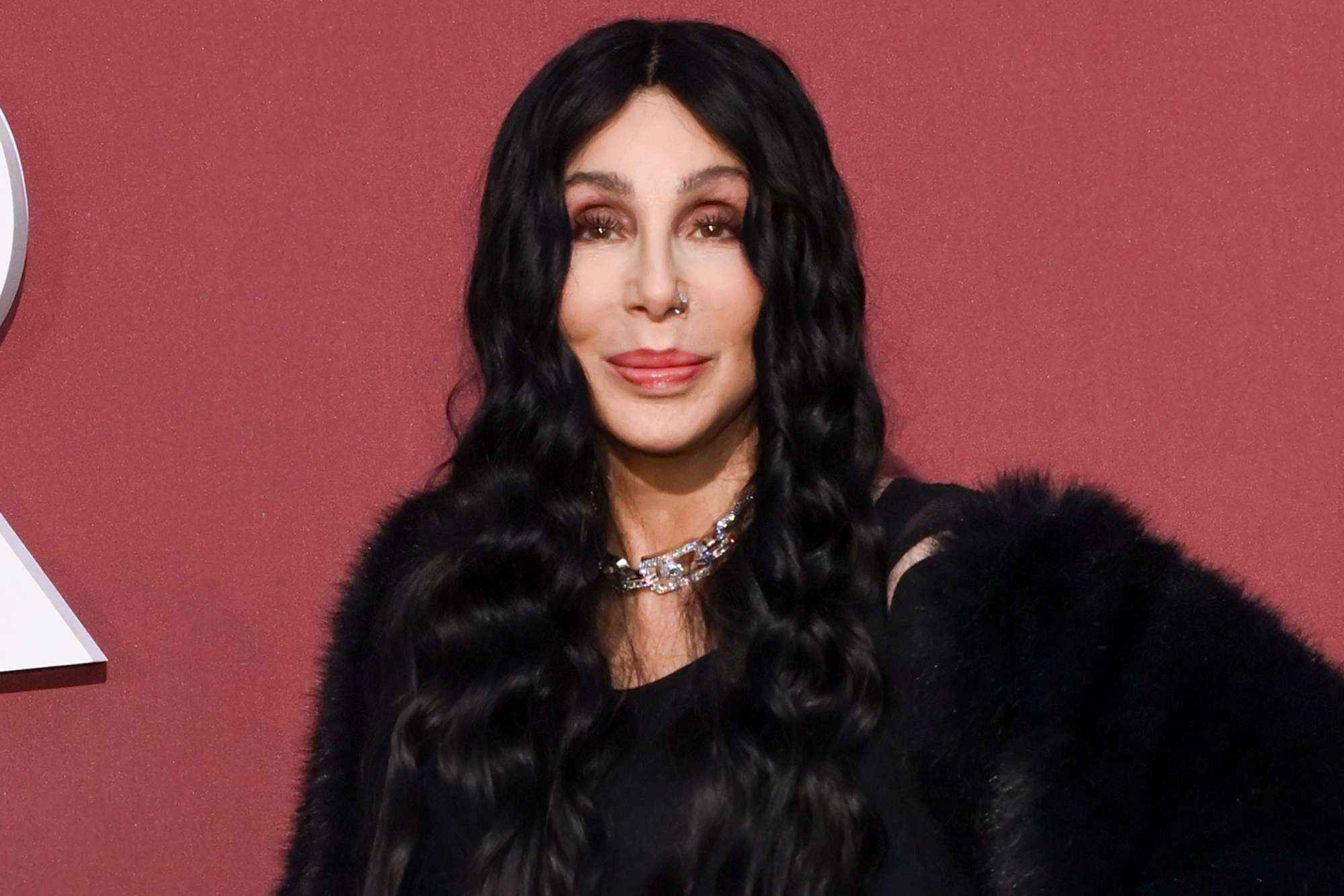 Cher Turns Back Time and Rocks Black Bodysuit Similar to One She Wore 35 Years Ago