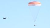 Leaky Soyuz spacecraft at space station returns to Earth in speedy landing