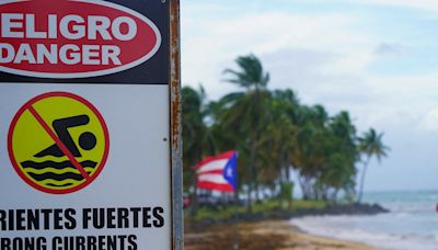 Hurricane Ernesto hits Puerto Rico with heavy rain and flooding