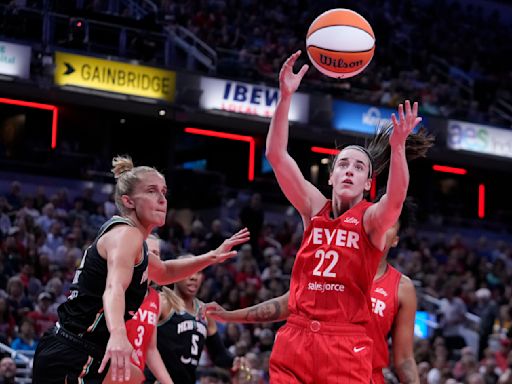 Caitlin Clark becomes first WNBA rookie to record a triple-double as Fever surge back to beat Liberty