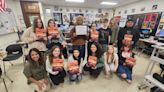 Shepard High School yearbook staff earns award from publisher