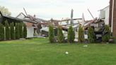 Storm damages property, causes uprooted trees and downed powerlines in metro Detroit