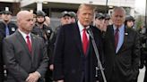 Trump attends wake of slain New York officer, calls for 'law and order'