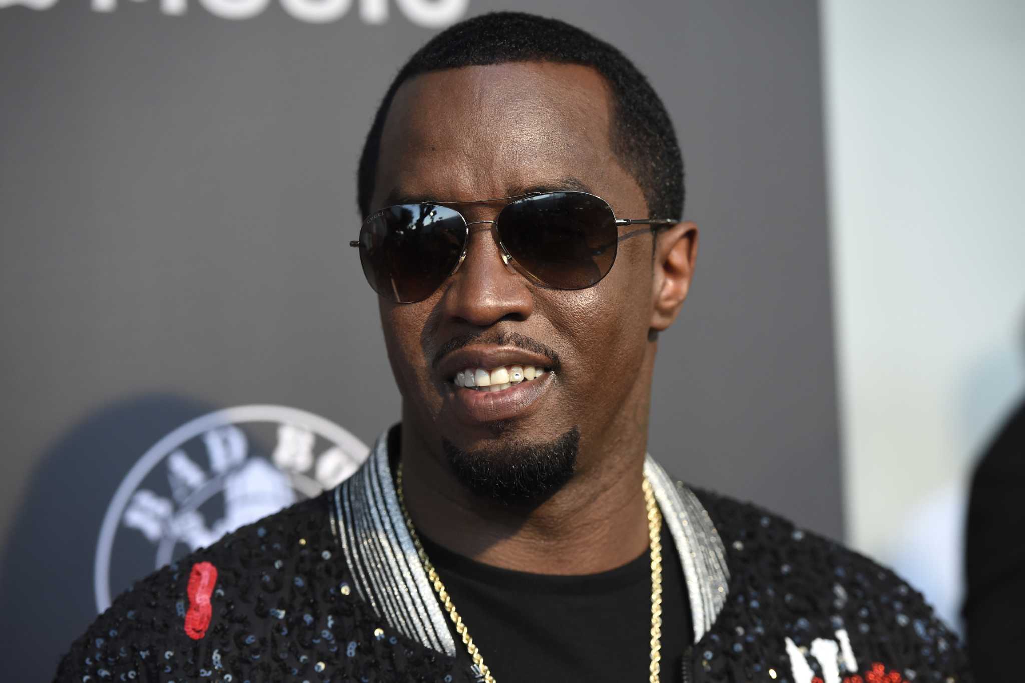 Video appears to show Sean 'Diddy' Combs beating singer Cassie in hotel hallway in 2016