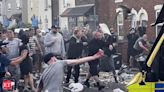 Violent crowd clashes with UK police after young girls killed - The Economic Times