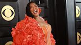 Lizzo Is Majestic in a Bright Orange Gown and Cape at the 2023 Grammys