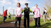 More than 100 arrested after protesters storm Grand National and delay race