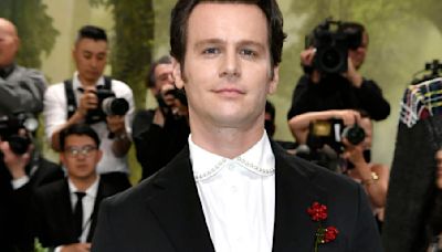 Jonathan Groff sports flower-adorned suit at 2024 Met Gala; Esquire and British GQ approve