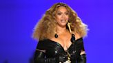 Beyoncé Wears Sleeveless Form Fitting Gown With Bright Pink Opera Gloves