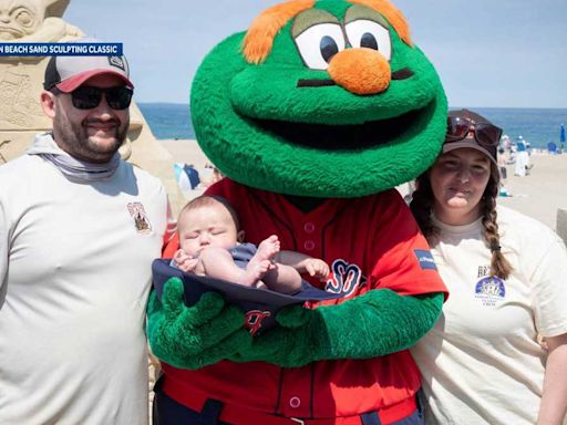 Hampton Beach Master Sand Sculpting Classic participants visited by Wally