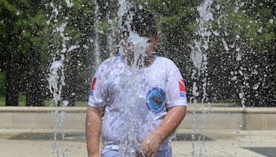 Americans coast-to-coast sweat out historic heat wave