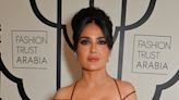 Salma Hayek, 57, puts on a very busty display in a plunging red dress