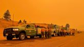 Under an orange sky, largest U.S. wildfire menaces New Mexico towns