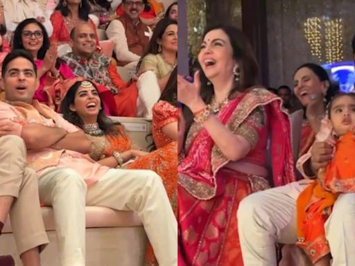 Akash Ambani, Anand Piramal Bond at Anant-Radhika's Wedding Function, Mukesh Ambani Holds Granddaughter Close - News18