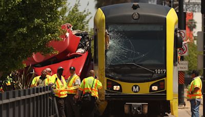More than 50 are injured when L.A. Metro train, bus collide outside Exposition Park