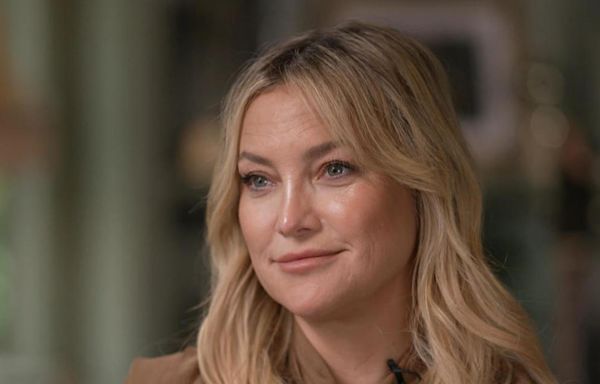 Kate Hudson says her relationship with her father, Bill Hudson, is "warming up"