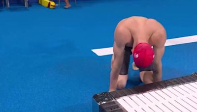 Team GB swimmer drops to floor in despair after breaking Olympics rule