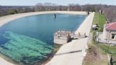 Draining of Highland Park reservoir complete following discovery of body; cleaning begins