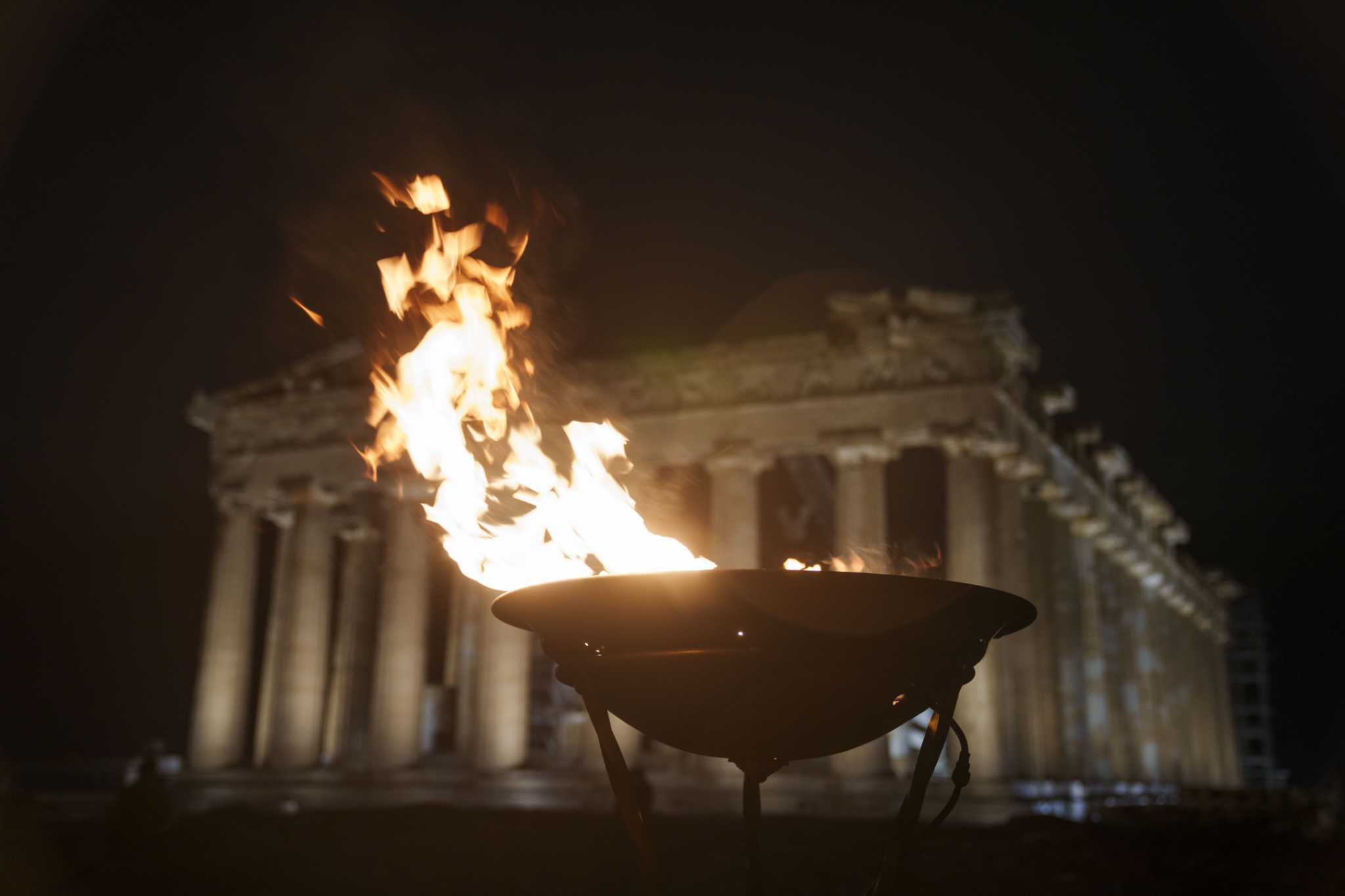 Olympic torch makes Acropolis overnight stop a week before handover to Paris organizers