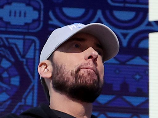 Eminem fires up crowd by kicking off NFL Draft with Detroit Lions stars