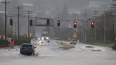 Atmospheric river soaks Pacific Northwest with record-breaking rain and unusually warm temperatures