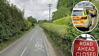 Road closed after occupants trapped in village crash