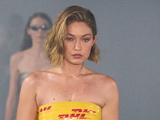 Gigi Hadid Recreates Kim Kardashian’s Taped-Up Look At Vetements PFW Show